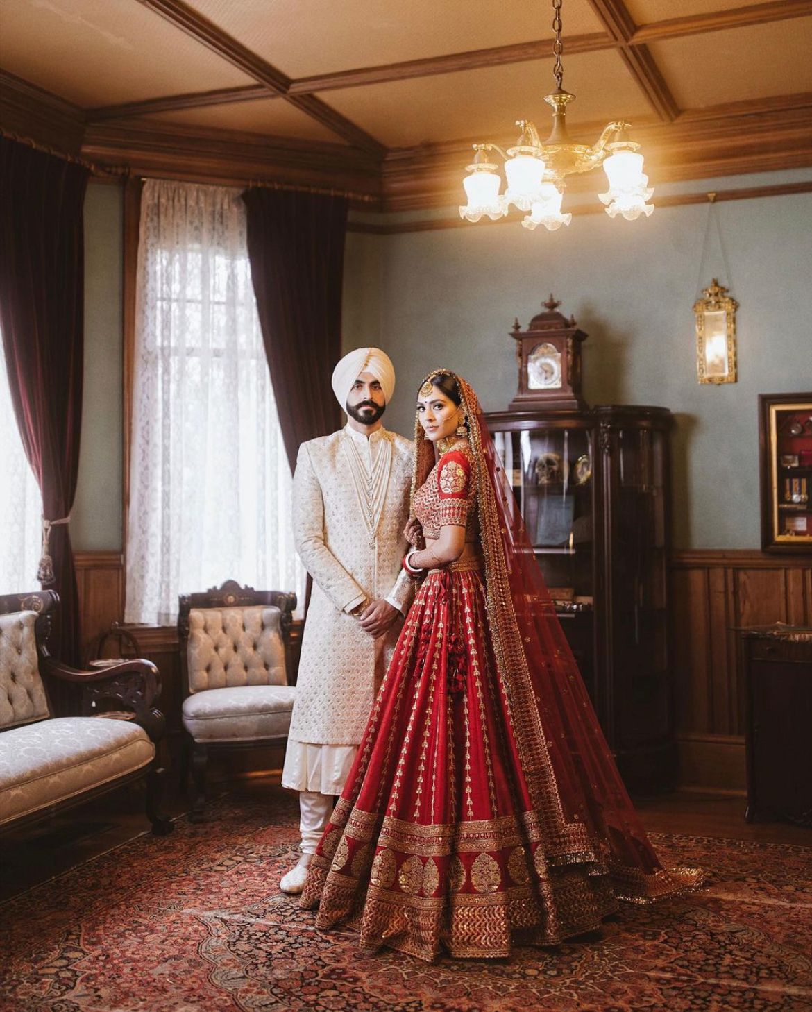 Sabyasachi Bride Donned A Red Tasselled Lehenga At Anand Karaj Styled It With A Backless Choli 